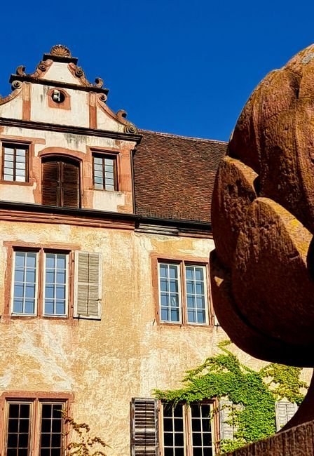 French Chateau Architecture: Mansard Roofs & Symmetrical Elegance