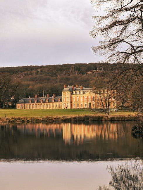 French Chateau Architecture: Mansard Roofs & Symmetrical Elegance