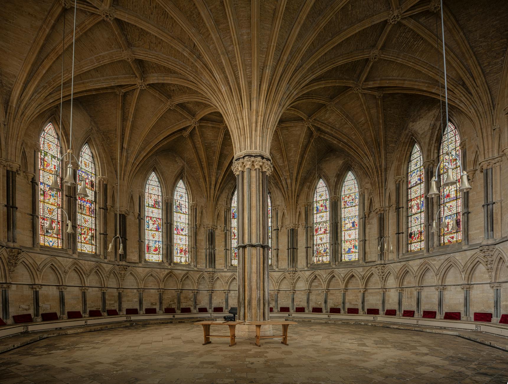 Gothic castle interior showing rib vaults, pointed arches, and clerestory windows